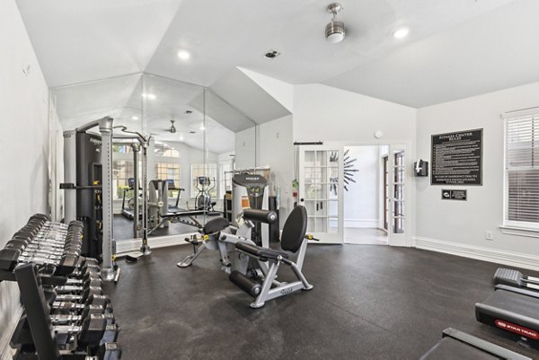 Modern fitness center with state-of-the-art equipment at Towns of Chapel Hill Apartments