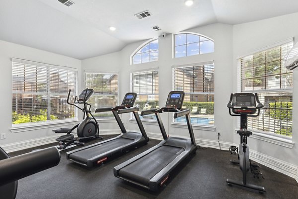 Fitness center with modern equipment at Towns of Chapel Hill Apartments