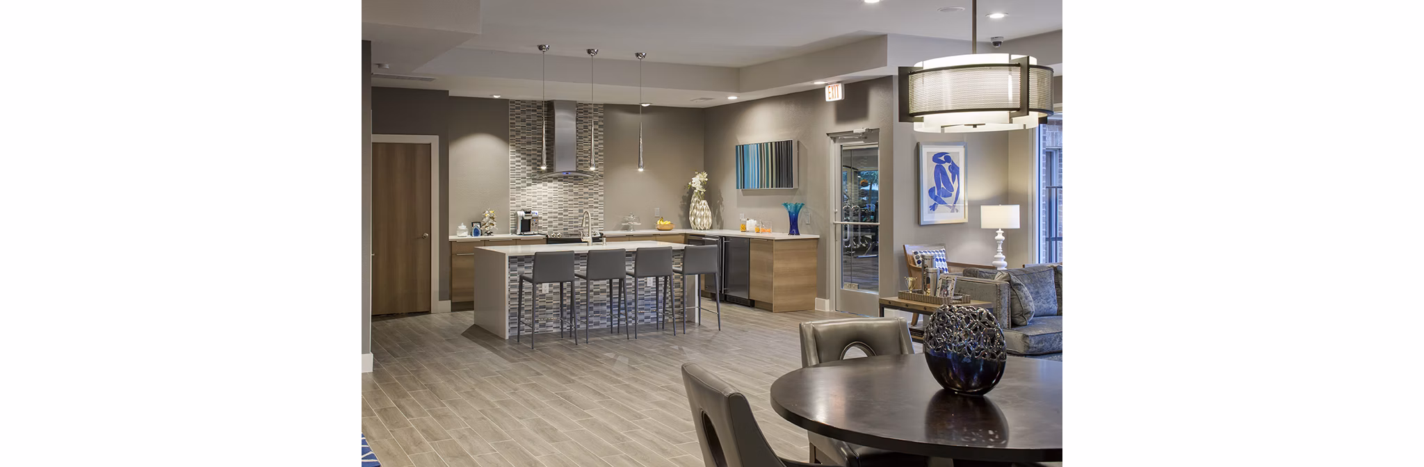 Clubhouse with modern amenities at The Village at Gracy Farms Apartments, offering luxury living spaces and community engagement opportunities