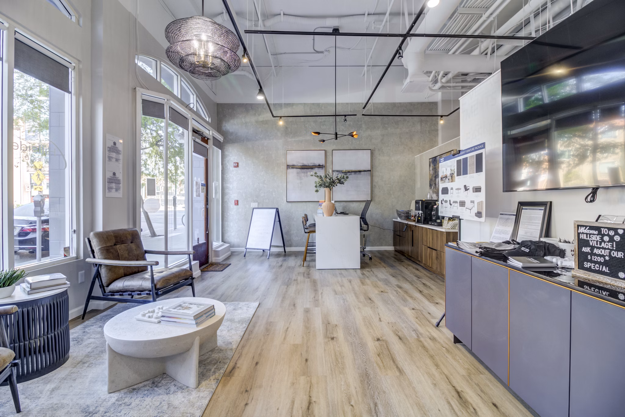 Clubhouse with cozy seating at Hillside Village Apartments, luxury community by Greystar