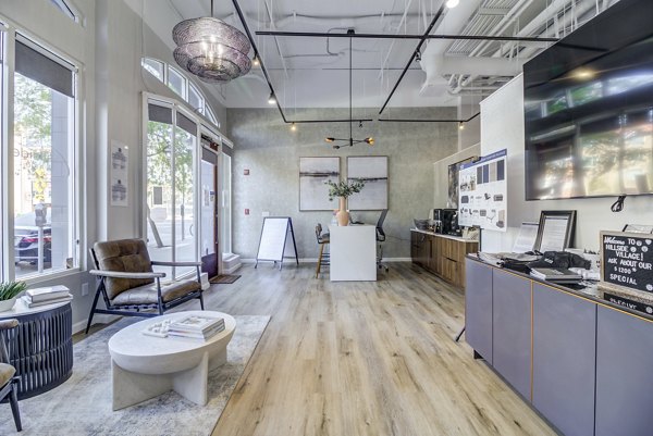 Clubhouse with cozy seating at Hillside Village Apartments, luxury community by Greystar
