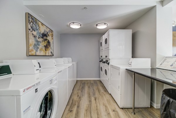 Hillside Village Apartments: Modern laundry facility with energy-efficient machines