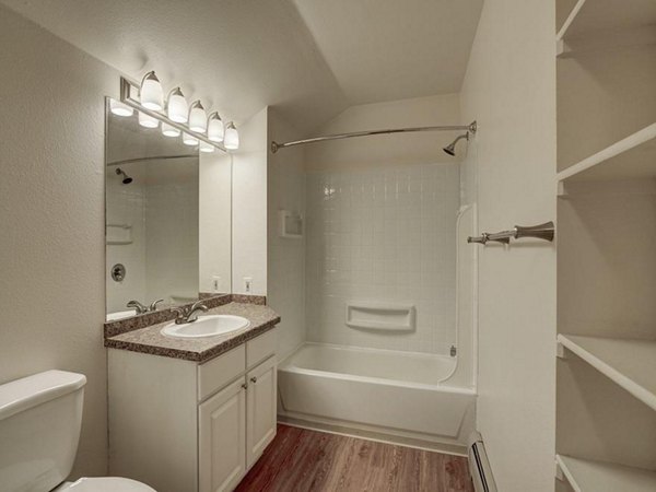 Bathroom featuring modern fixtures and elegant design at The View on 26th Apartments