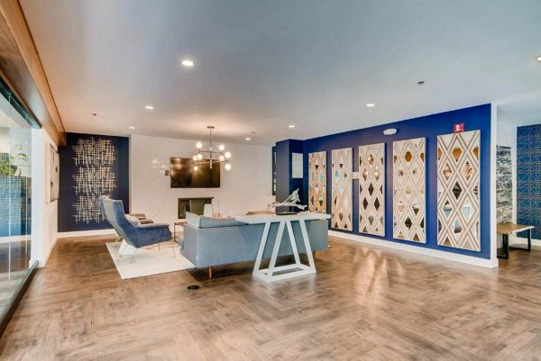Clubhouse with contemporary design and open space at The View on 26th Apartments, a Greystar luxury community