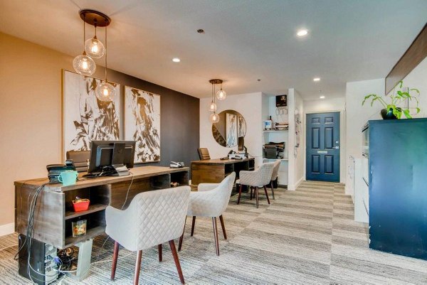 Clubhouse with modern design features at The View on 26th Apartments, showcasing luxury living spaces and communal gathering areas