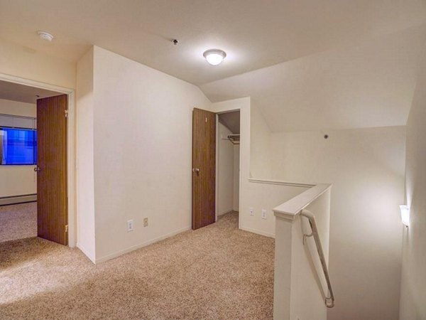 Spacious interior with modern design elements at The View on 26th Apartments