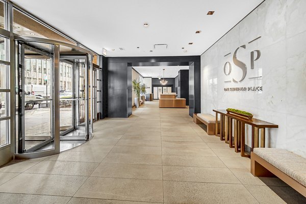 Clubhouse lobby with modern decor and comfortable seating at One Superior Place Apartments in Chicago â€“ designed for luxury living