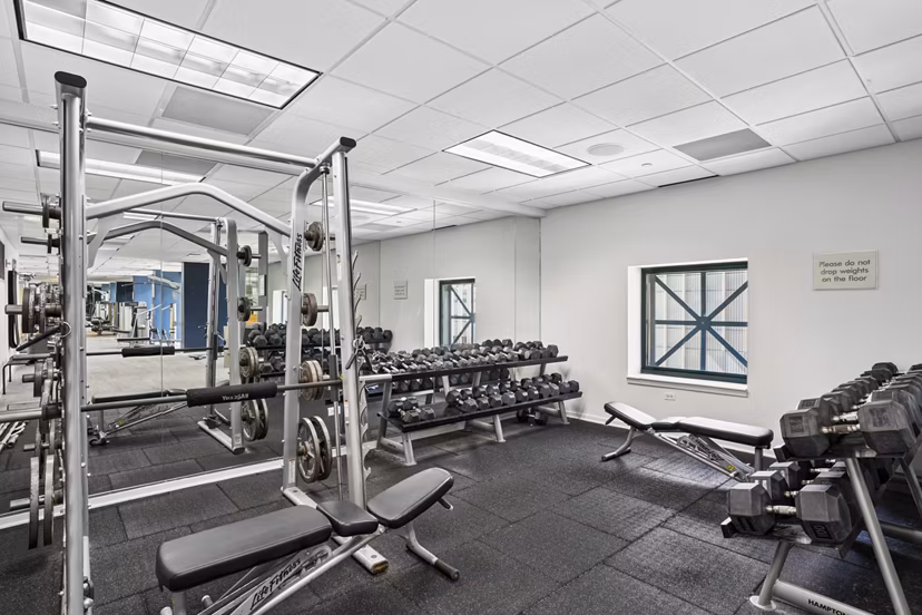 fitness center at One Superior Place Apartments