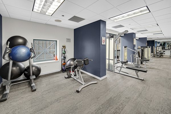 fitness center at One Superior Place Apartments