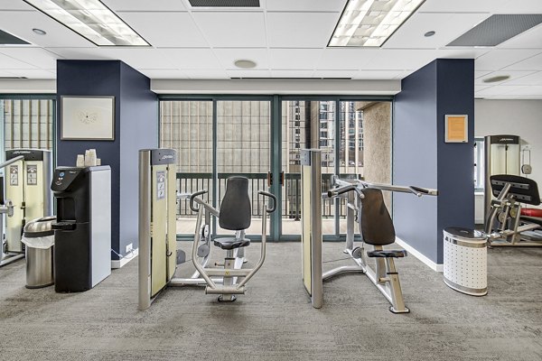 fitness center at One Superior Place Apartments