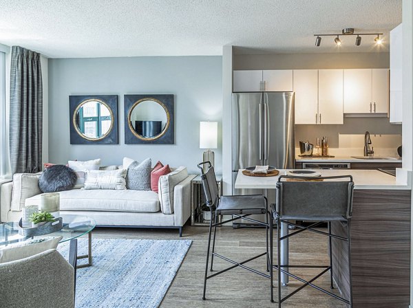 Dining room featuring modern decor and elegant lighting at One Superior Place Apartments