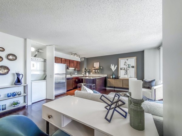 Modern living room with stylish furniture at One Superior Place Apartments, a Greystar luxury property in downtown Chicago