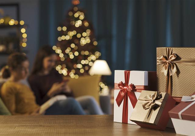 Women Enjoying Living Room Decorated for Christmas | Blog | Greystar