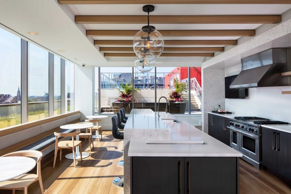 Chic clubhouse with modern decor at 1225 Old Town Apartments offering a luxurious social space