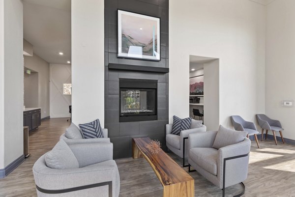 Clubhouse with modern design and cozy seating at Vue 21 Apartments, luxury apartment community by Greystar