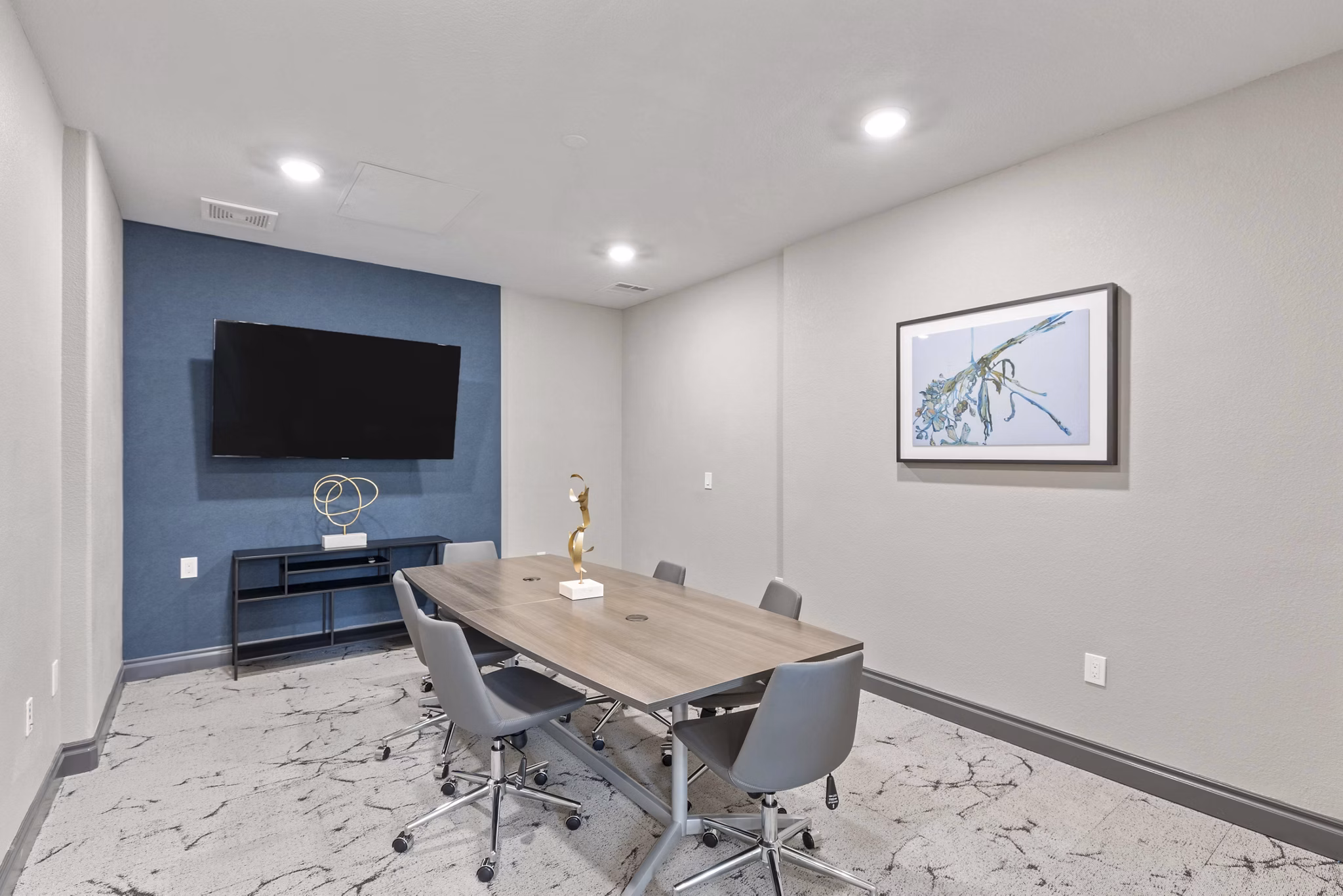 Professional meeting facility with modern seating and conference technology at Vue 21 Apartments