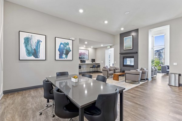Vue 21 Apartments: Modern clubhouse featuring stylish seating and entertainment areas