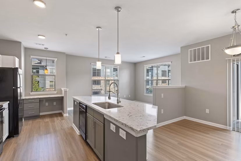 Sleek modern kitchen with stainless steel appliances at Vue 21 Apartments luxury living