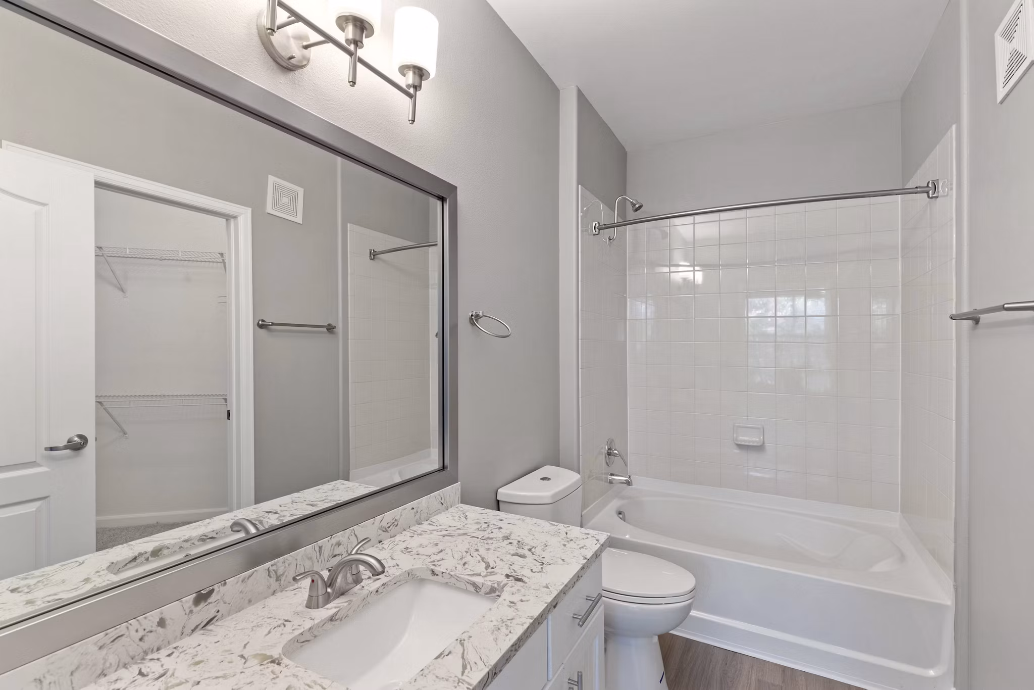 Modern kitchen with stainless steel appliances at Vue 21 Apartments in Greystar's luxury collection