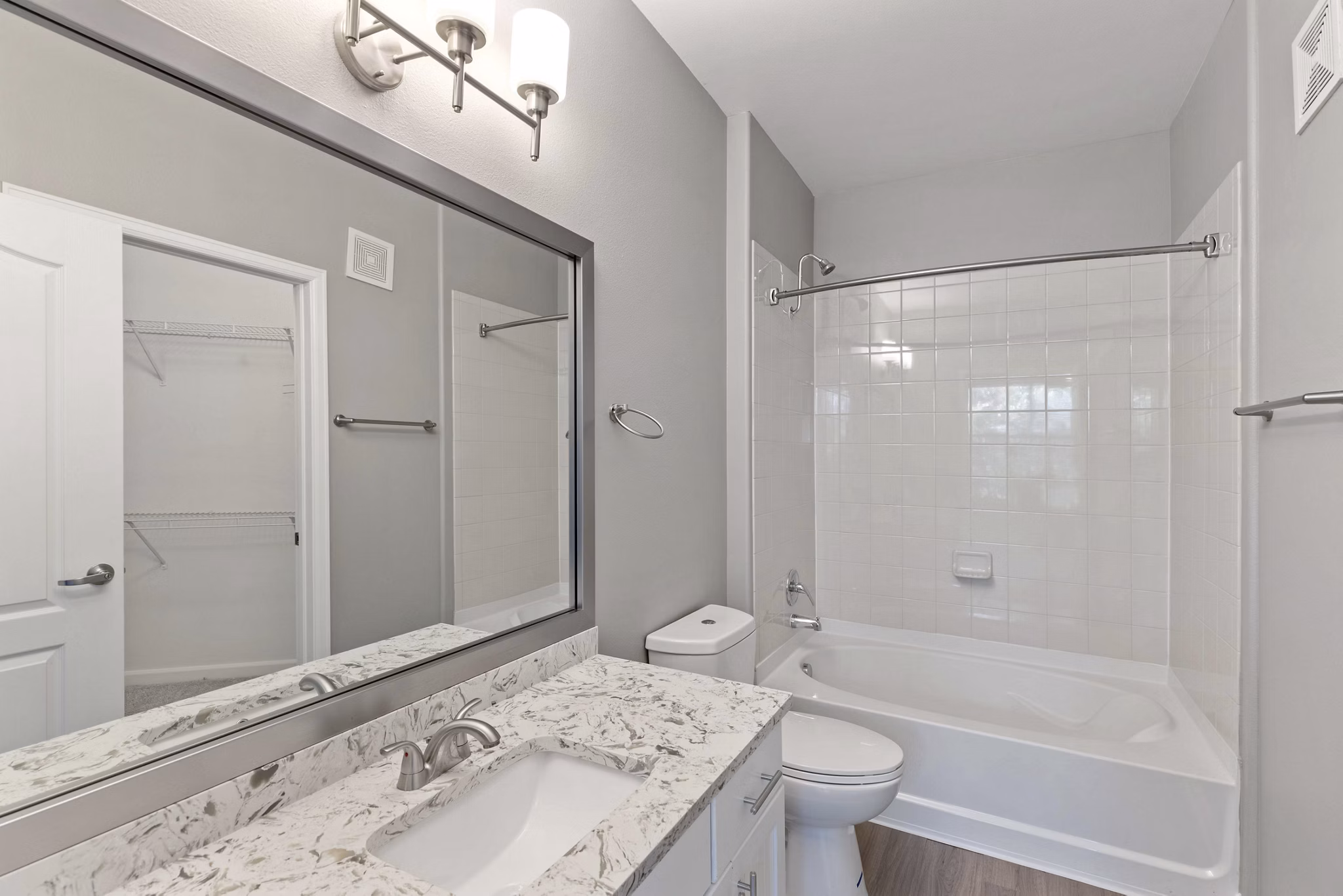 Modern kitchen with stainless steel appliances at Vue 21 Apartments in Greystar's luxury collection