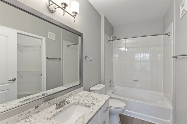 Modern kitchen with stainless steel appliances at Vue 21 Apartments in Greystar's luxury collection