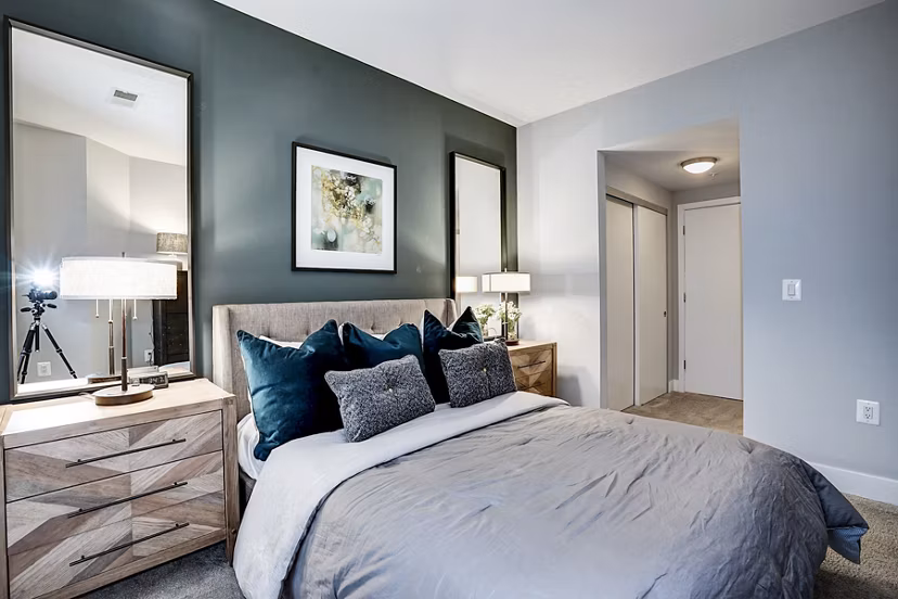 Cozy bedroom with modern design elements at Del Ray Central Apartments