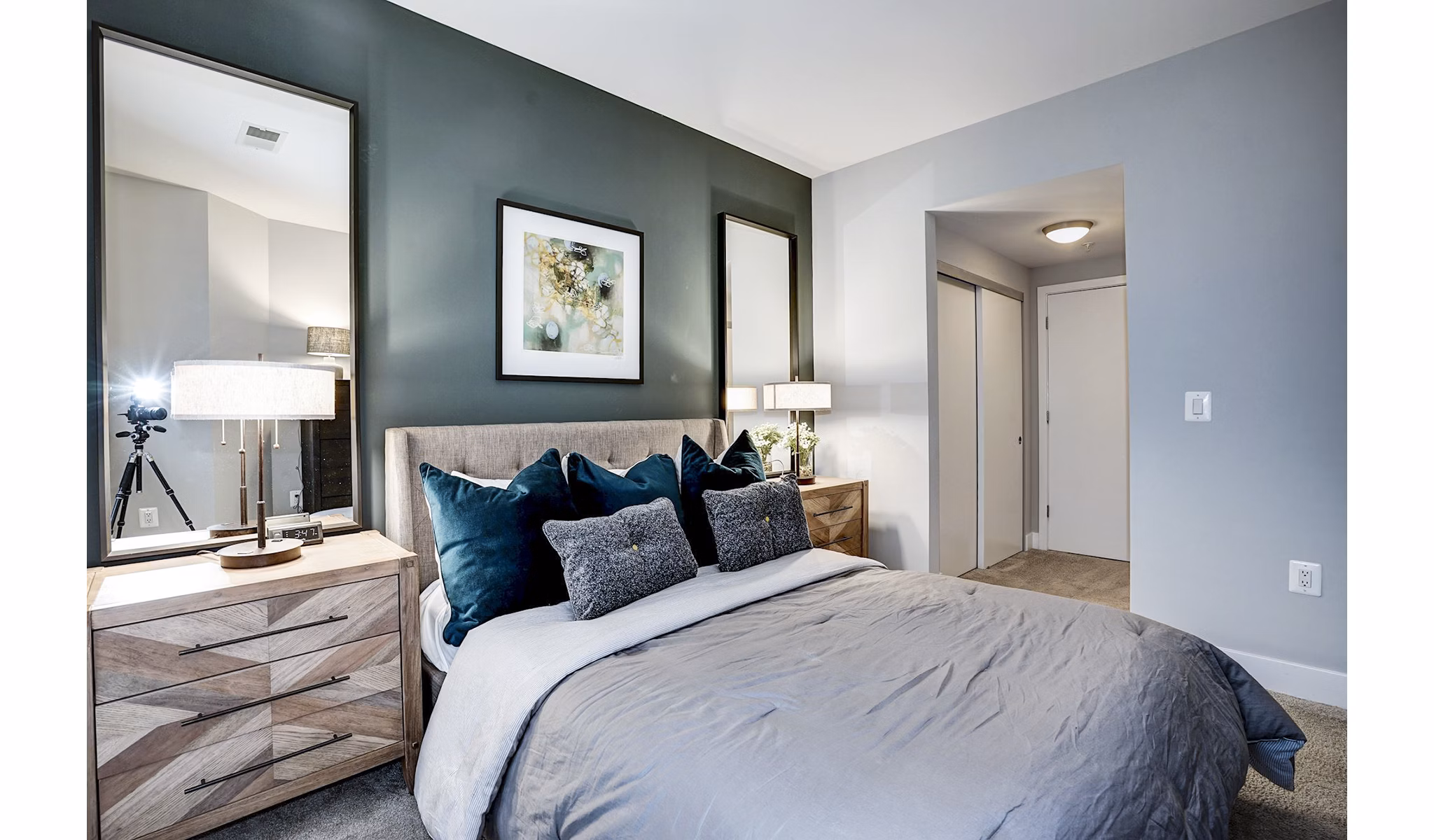 Cozy bedroom with modern design elements at Del Ray Central Apartments
