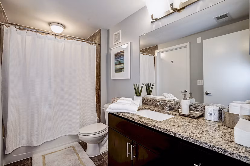 Modern bathroom featuring elegant fixtures at Del Ray Central Apartments