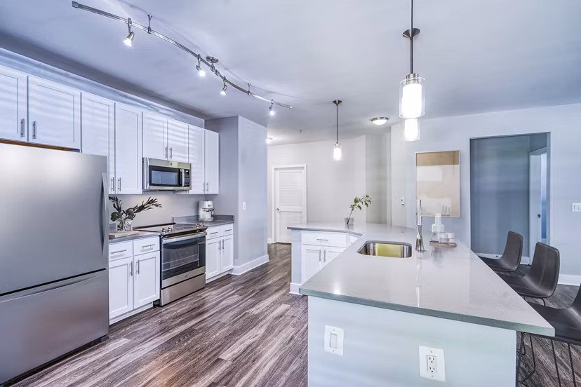 Modern kitchen with stainless steel appliances at Del Ray Central Apartments