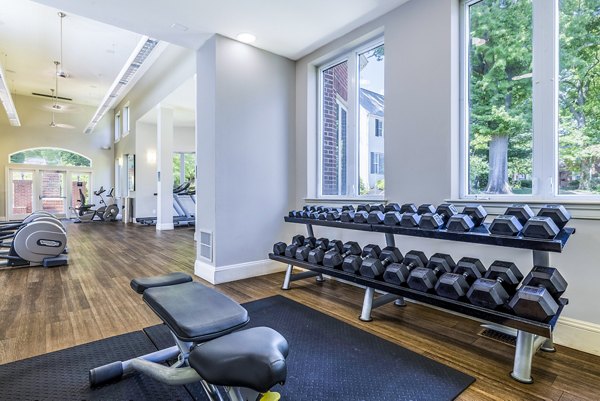Fitness center with modern equipment at Village at Fox Point Apartments in Wilmington