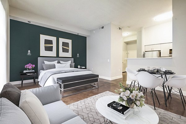 Bedroom featuring a cozy design and modern decor at Massachusetts Court Apartments