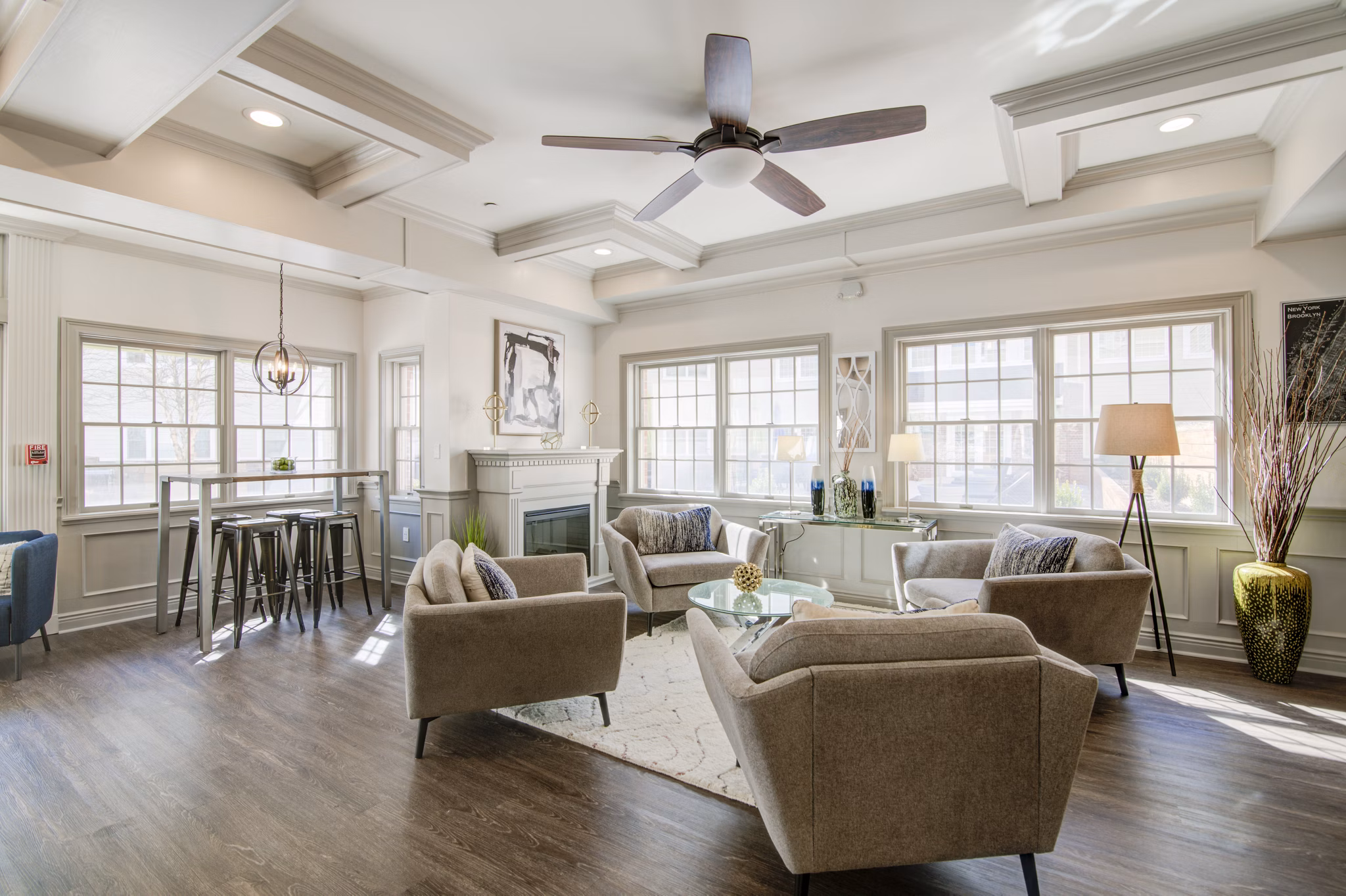 Clubhouse with modern design and cozy seating at The Hawthorne Apartments