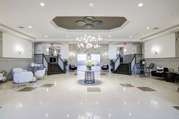 Clubhouse featuring elegant lounge seating and modern decor at The Hawthorne luxury apartments
