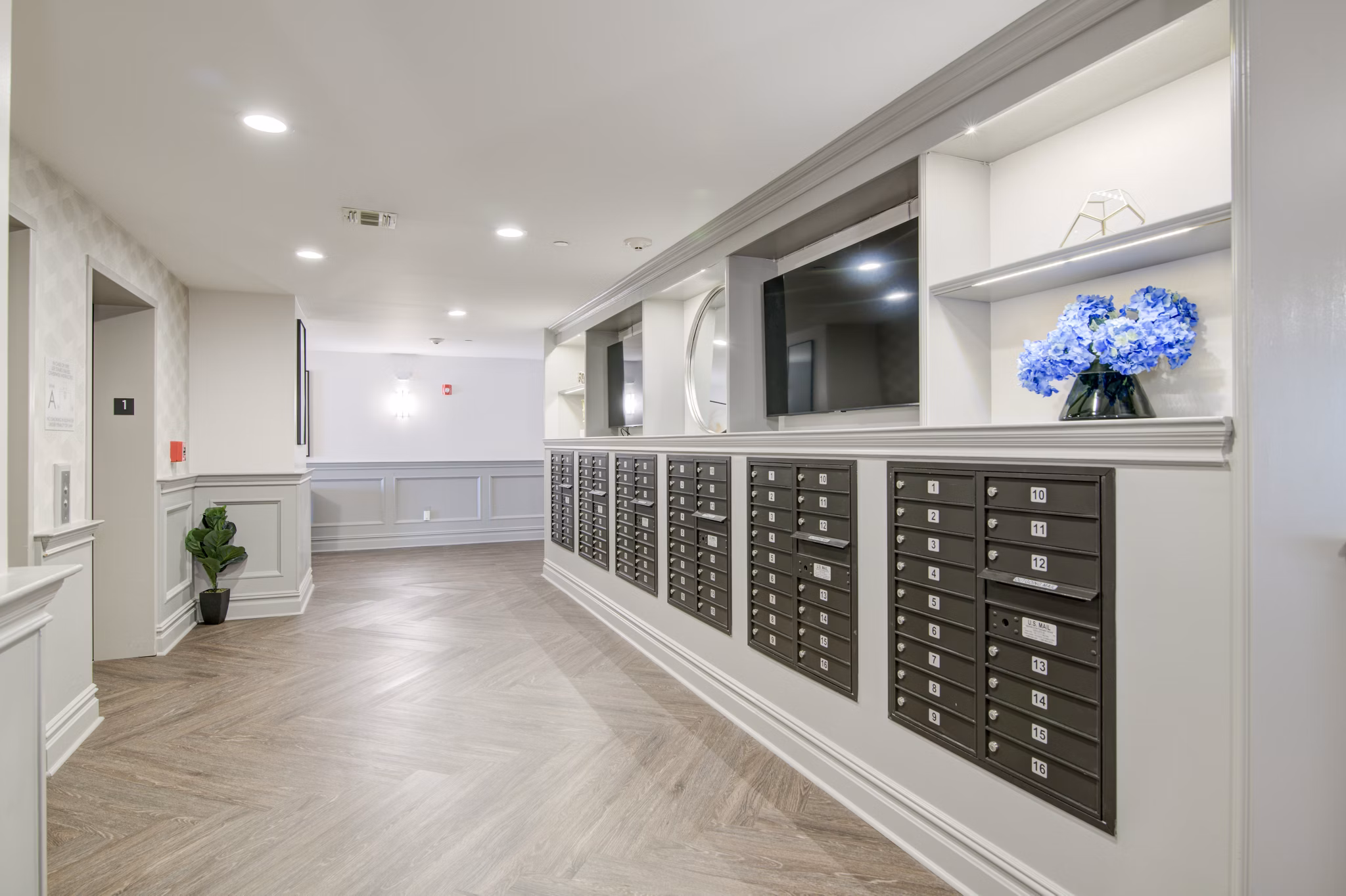 Mailroom with secure package lockers at The Hawthorne Apartments