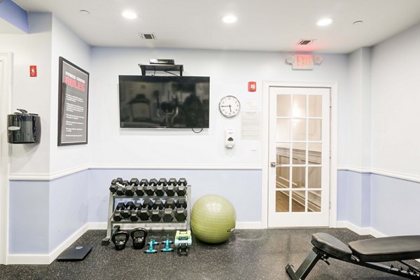 Modern fitness center featuring state-of-the-art equipment at The Hawthorne Apartments in Greystar community