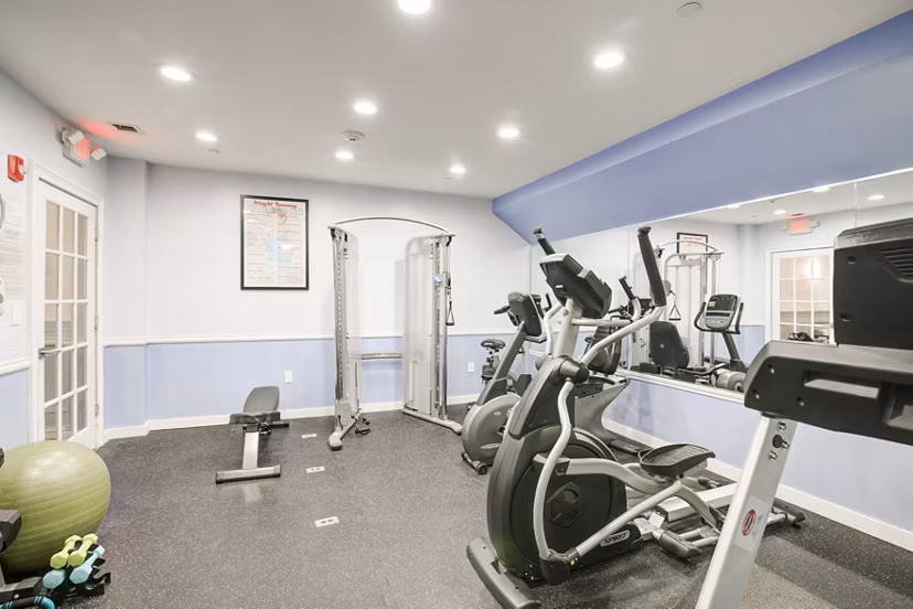 State-of-the-art fitness center with modern equipment at The Hawthorne Apartments