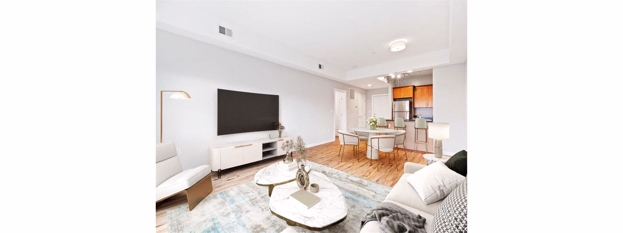 Spacious living room with modern furnishings at The Hawthorne Apartments