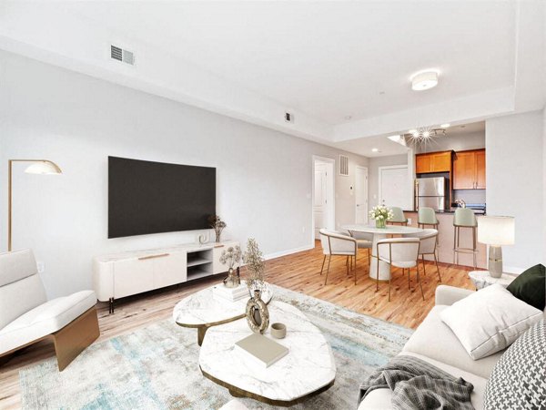 Spacious living room with modern furnishings at The Hawthorne Apartments