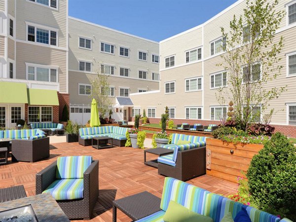 Courtyard with lush landscaping at The Hawthorne Apartments, luxury living in a Greystar-managed community