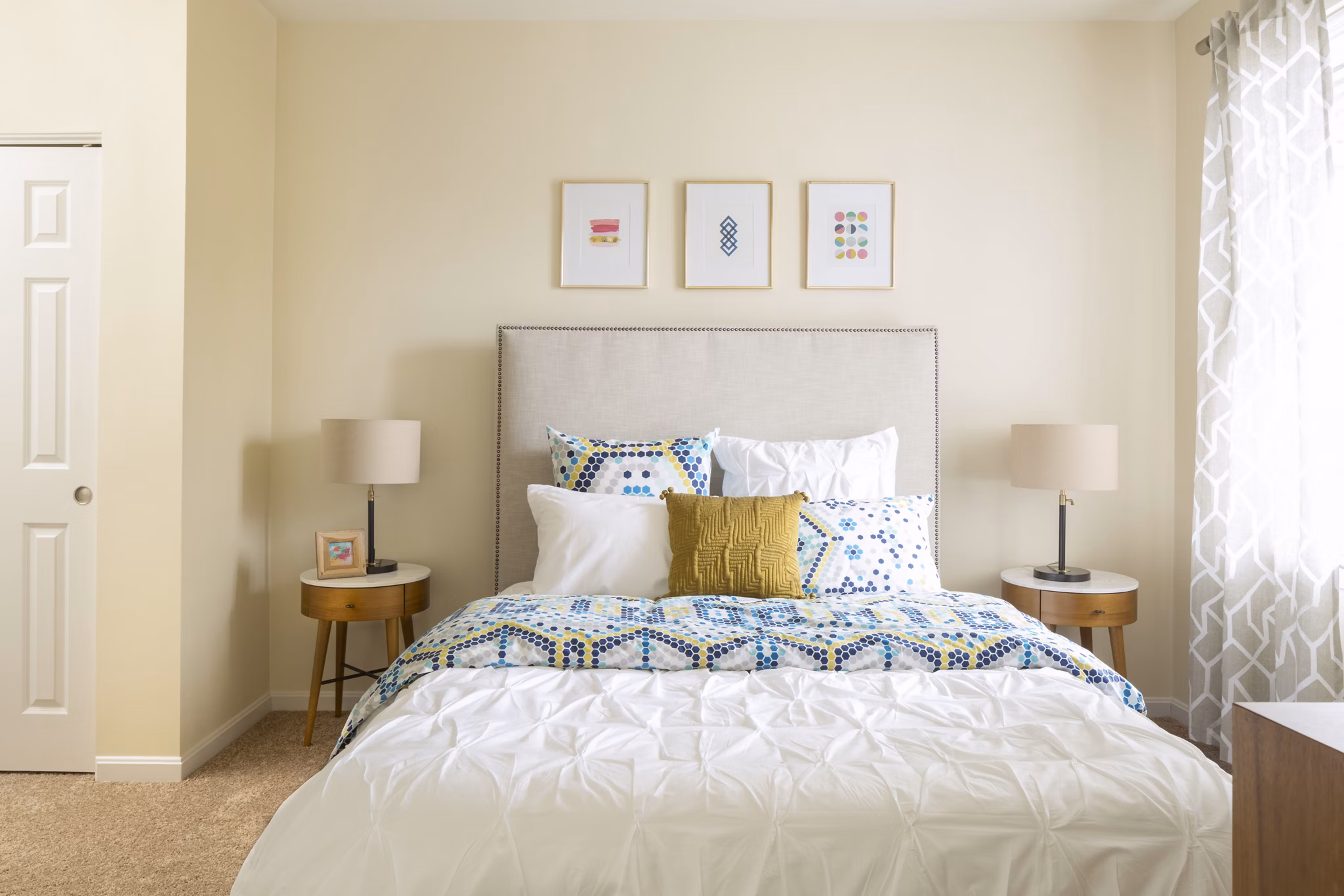 Cozy bedroom featuring modern decor at The Prescott at Concord Apartments