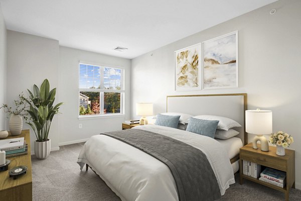 Elegant bedroom with contemporary decor in The Prescott at Concord Apartments