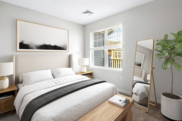 Cozy bedroom with modern furnishings at The Prescott at Concord Apartments