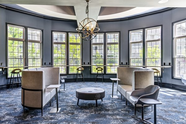Clubhouse featuring modern design and comfortable seating at The Prescott at Concord Apartments