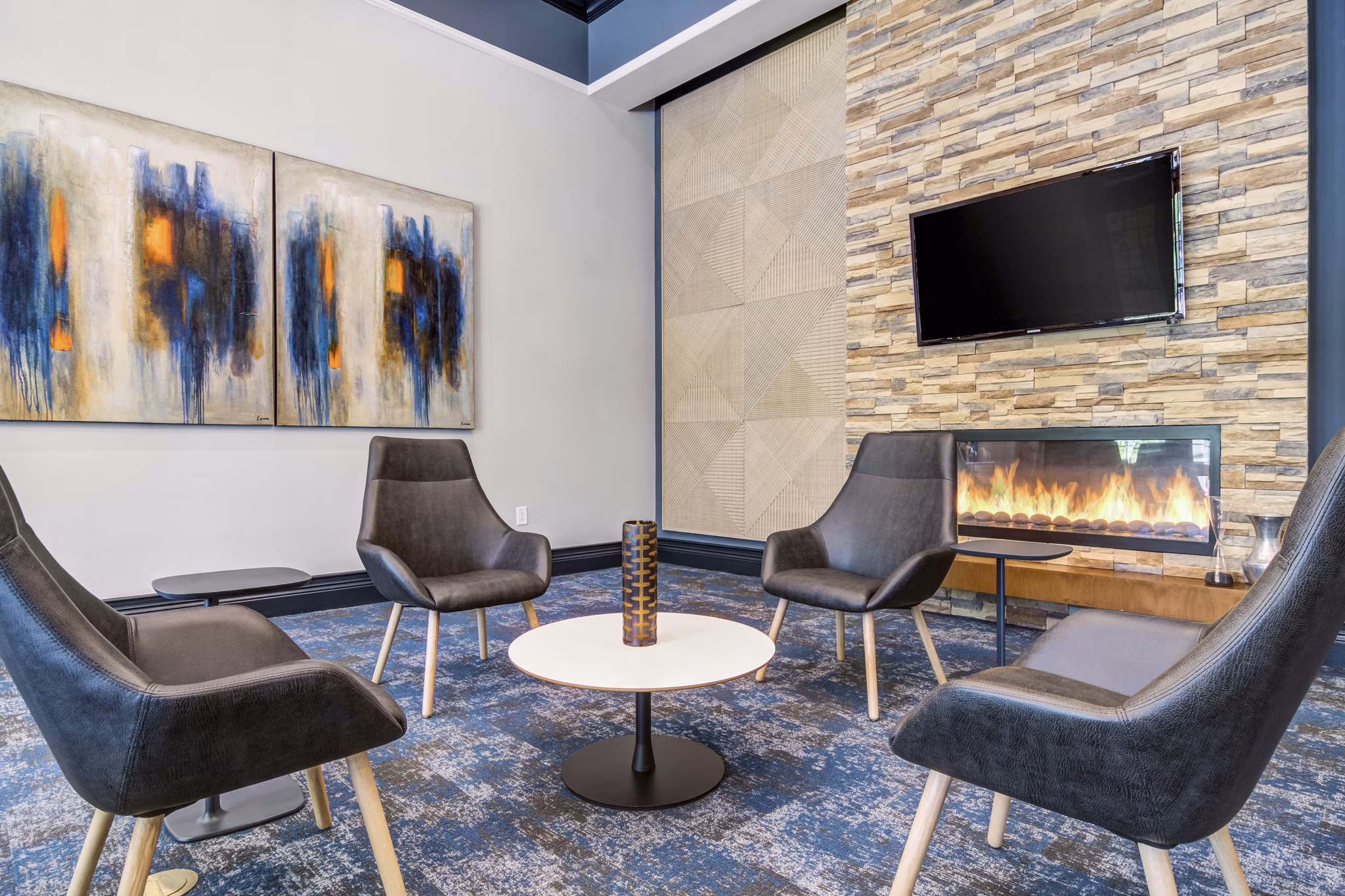 Elegant clubhouse featuring modern design at The Prescott at Concord Apartments, perfect for luxury living and gatherings