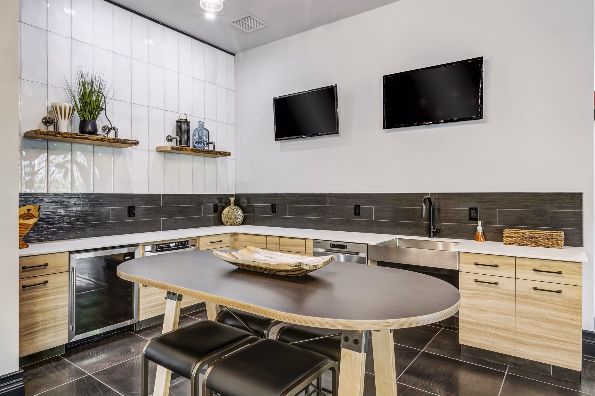 Modern clubhouse with plush seating and billiards table at The Prescott at Concord Apartments