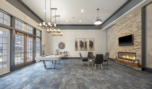 Clubhouse featuring modern design and community space at The Prescott at Concord Apartments