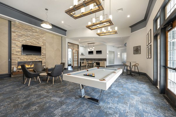 Clubhouse featuring modern decor and seating at The Prescott Luxury Apartments in Concord