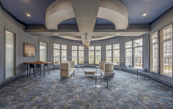 Elegant clubhouse with modern design at The Prescott at Concord Apartments, perfect for social gatherings