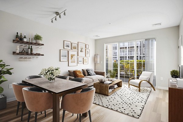 Dining area featuring modern decor and large windows in The Prescott at Concord Apartments