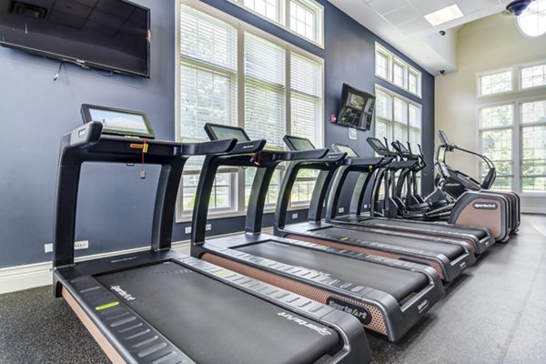 State-of-the-art fitness center with modern equipment at The Prescott at Concord Apartments